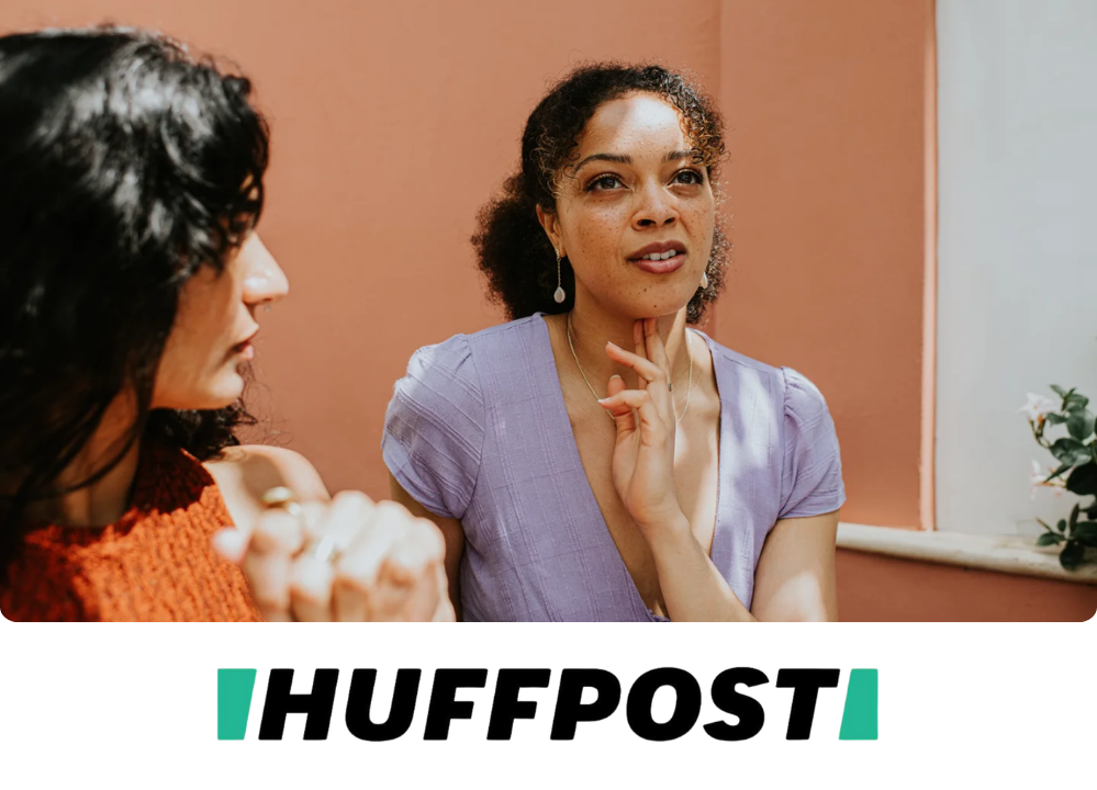 Stock Image of a woman thinking with her hands on her chin.