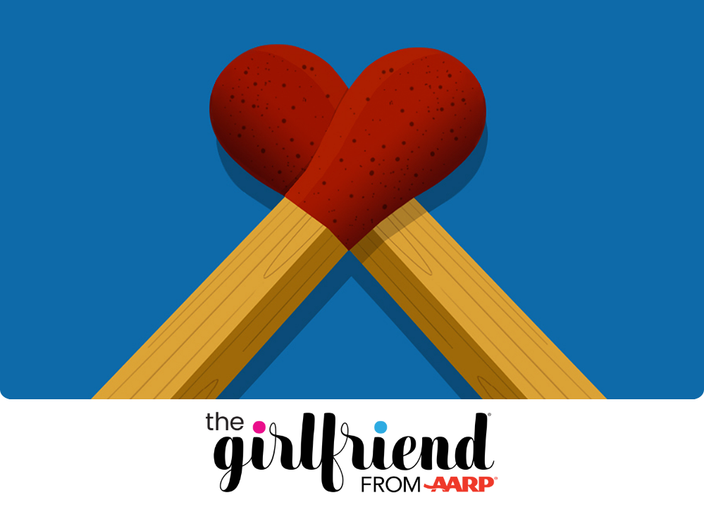 Stock image of two wooden matchsticks crossed at an angle against a blue background, with their red heads overlapping to form the shape of a heart.